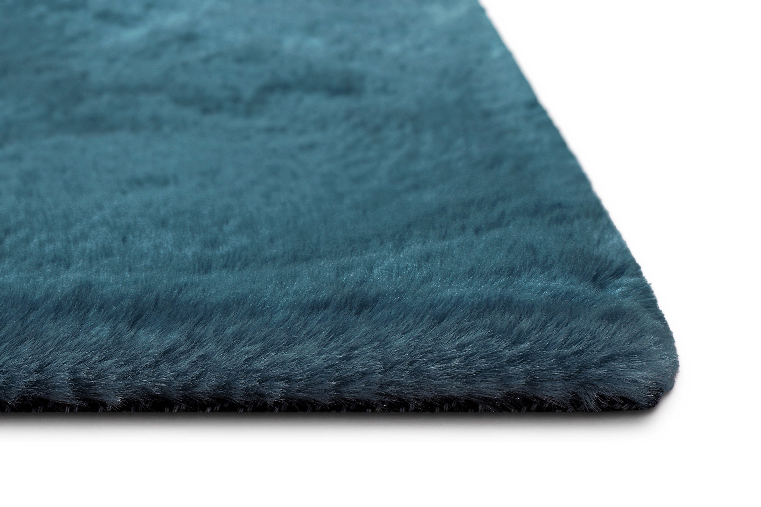 weconhome-basics-anna-kunstfell-teppich-petrol-hochflor image 5