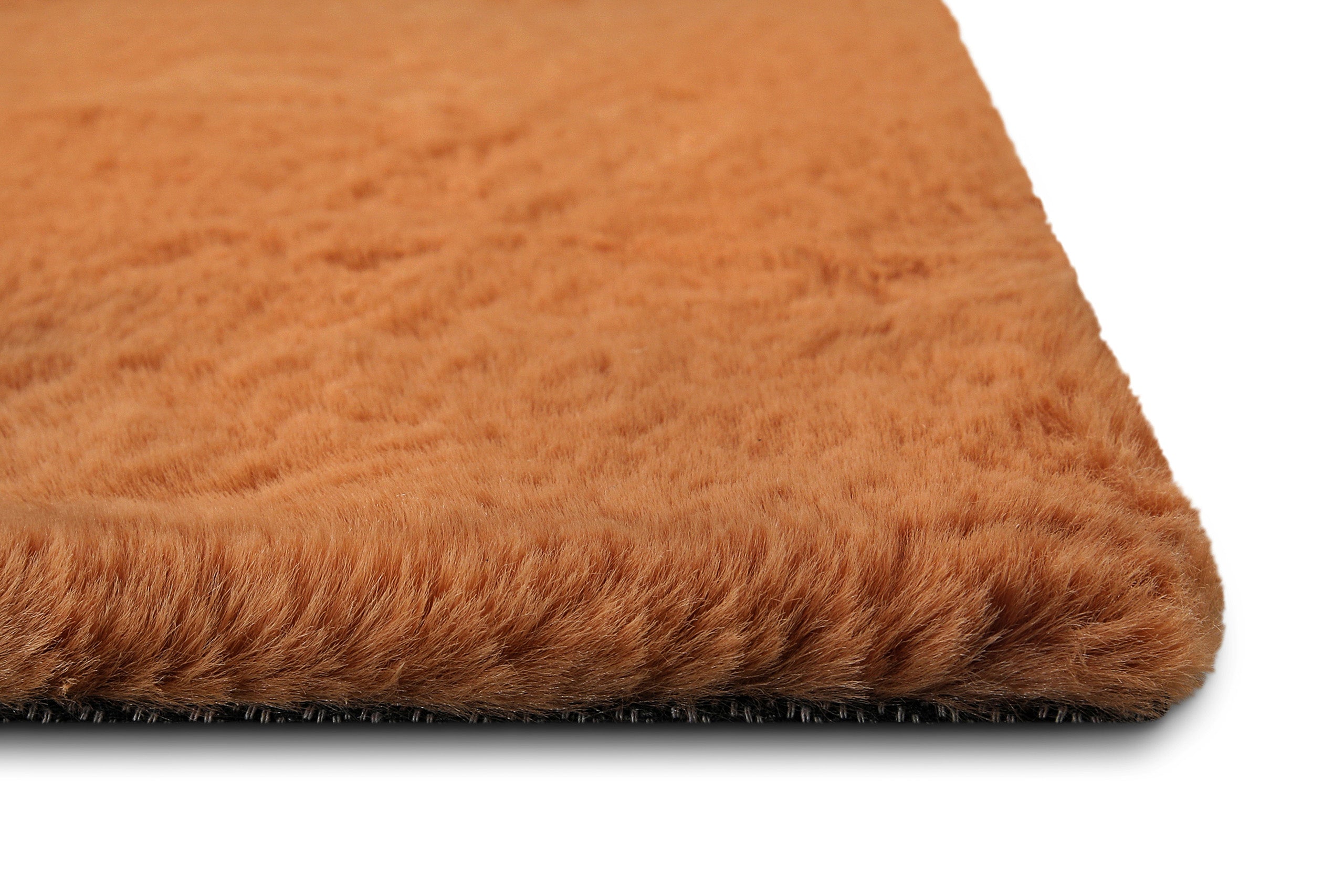 weconhome-basics-kunstfell-teppich-anna-terracotta-flauschig-weich-getuftet-100- image 5